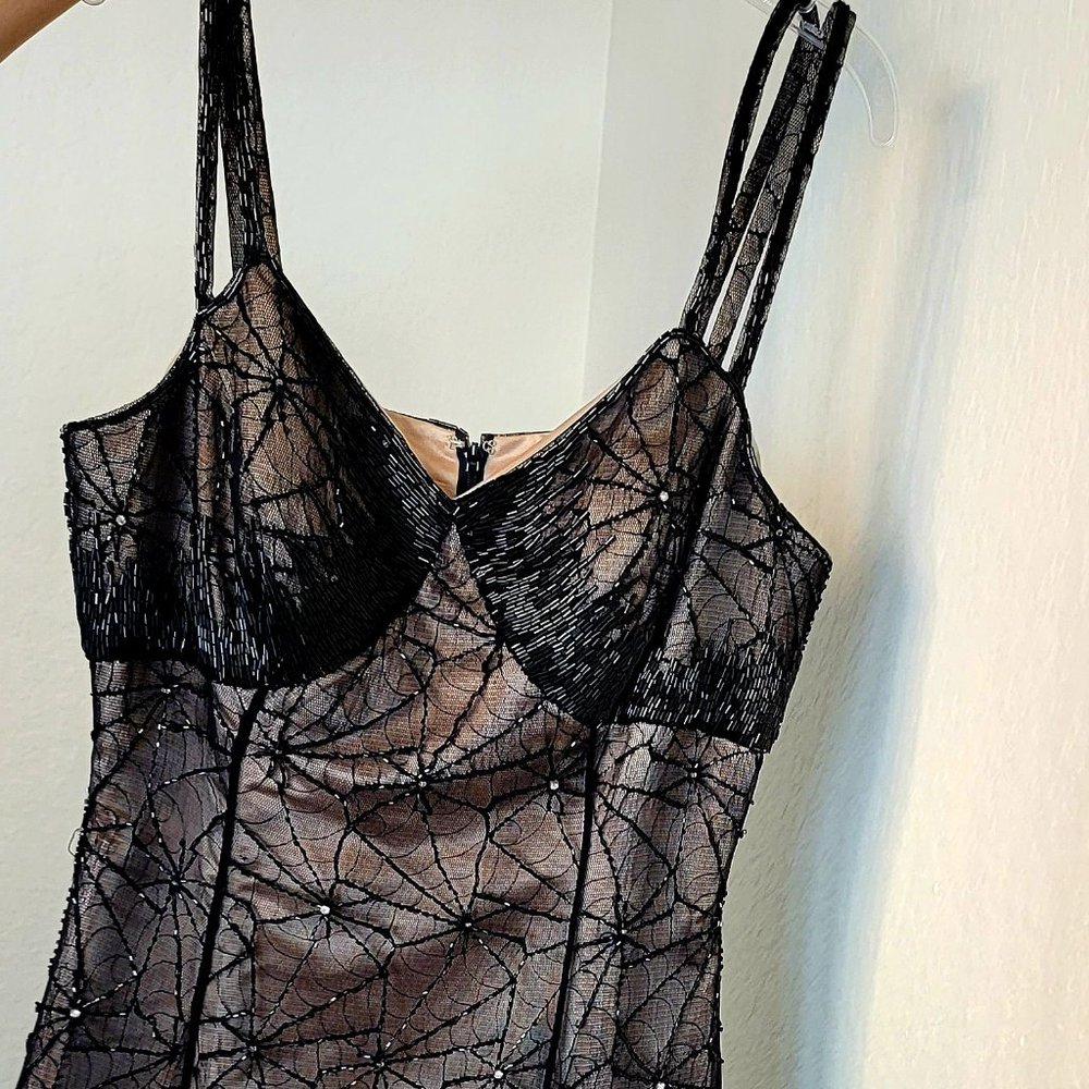 Formal beige and black lace dress